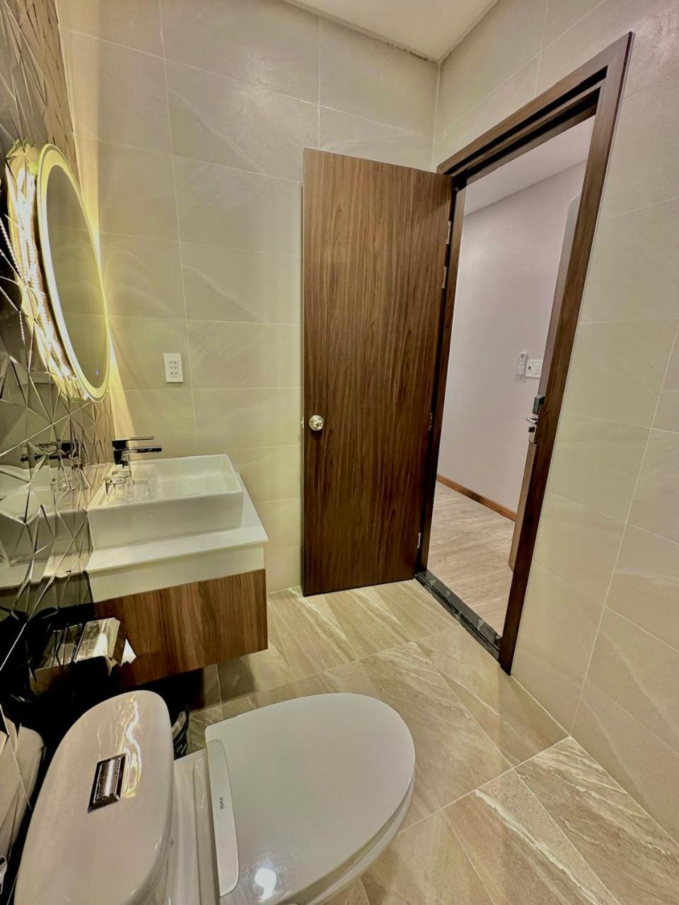 Vin Hotel Виньлонг Экстерьер фото
