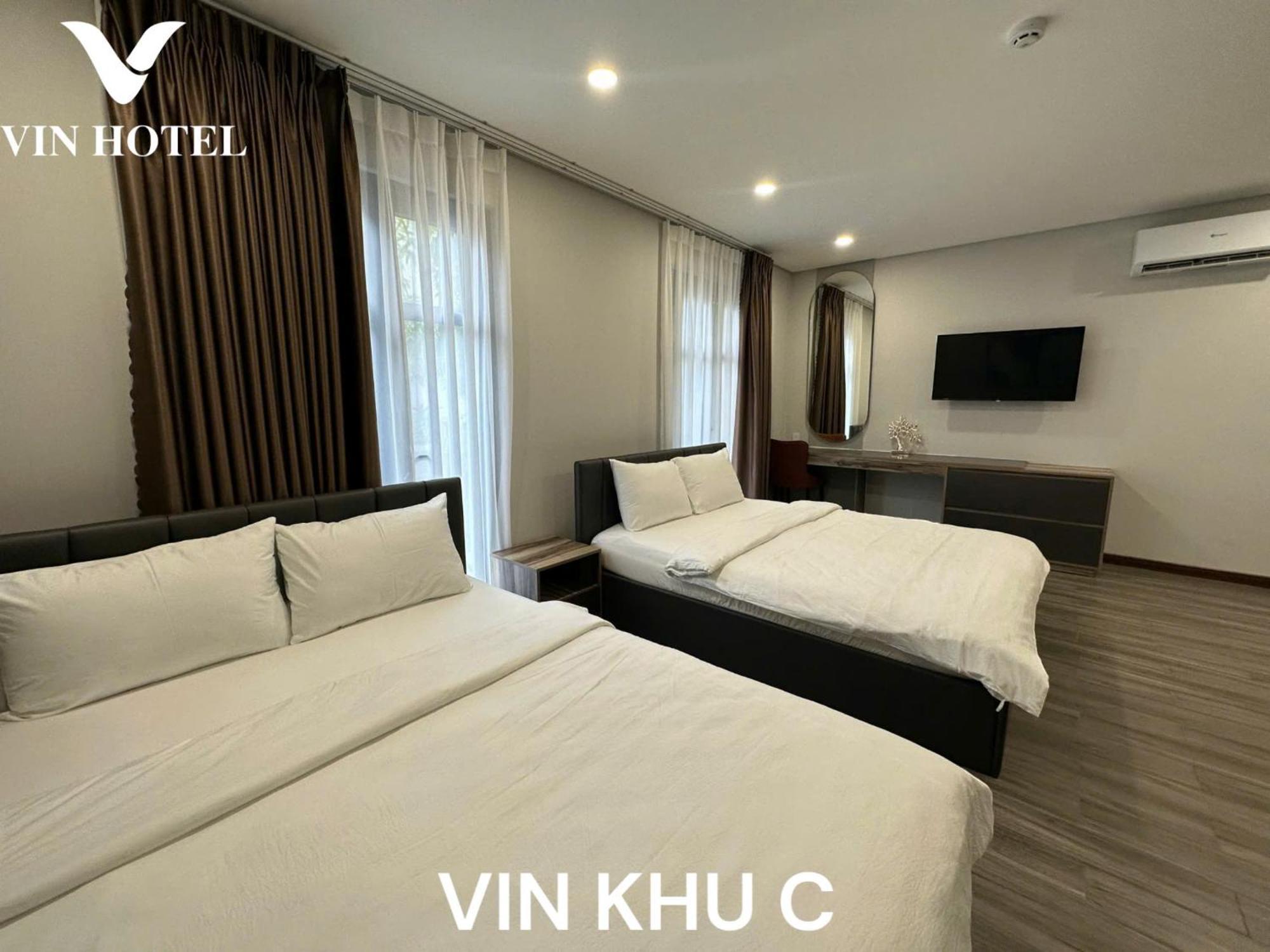 Vin Hotel Виньлонг Экстерьер фото